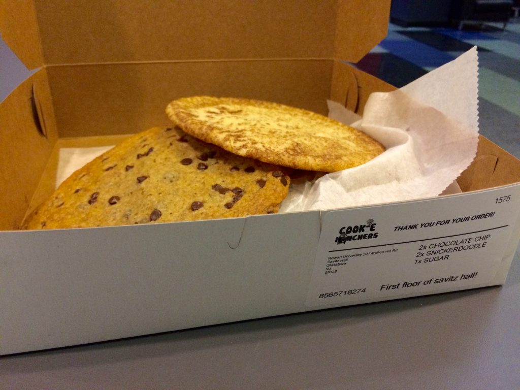Freshly baked cookies in a delivery box