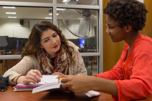 student studies in student center