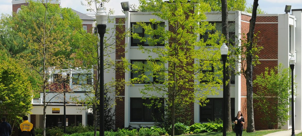Evergreen Hall through trees