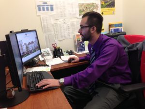 Academic advisor works at his desk