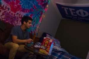 student sits in room