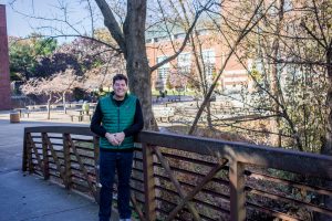 Professor Howell stands outside the student center