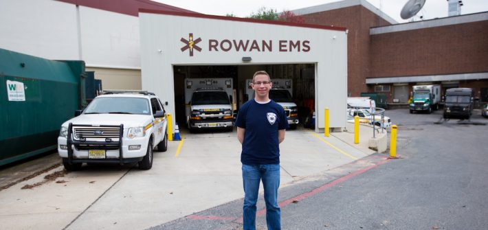 Rowan student Kevin standing outside Rowan EMS building