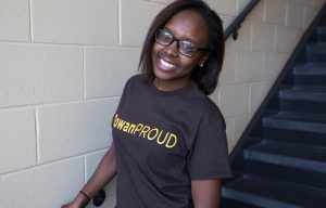 Rowan student Destiny in #ROWANproud teeshirt inside education building James Hall 