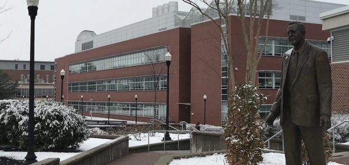 henry rowan statue outside savitz hall at Rowan University