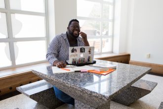 Mark inside Campbell Library at Rowan on campus