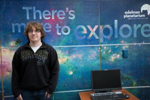 Jeremy outside the planetarium at Rowan inside Science Hall 