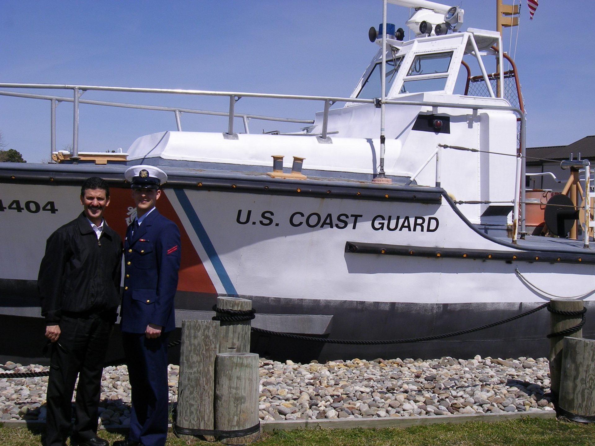 Brandon, a Rowan Student by a US Coast Guard Boat