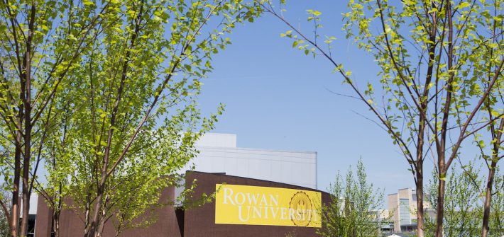 Rowan University Wilson Hall with Rowan Banner in springtime