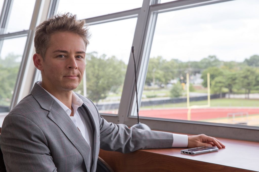 Emil Steiner inside the rowan university football sports booth