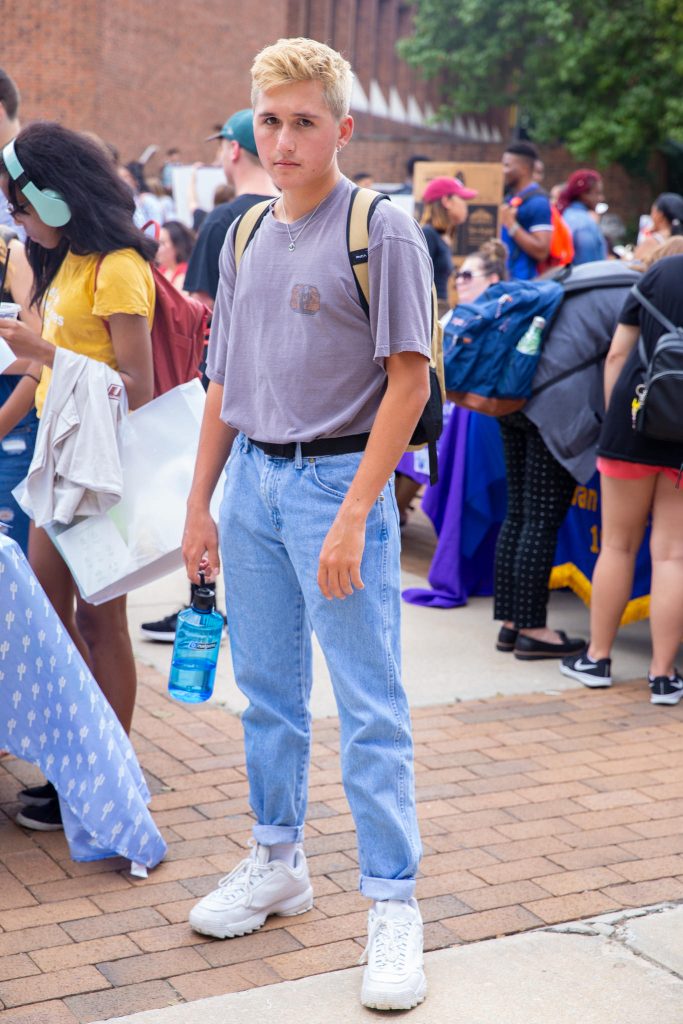 jacob hellick, a freshman wearing blue jeans and a purple shirt