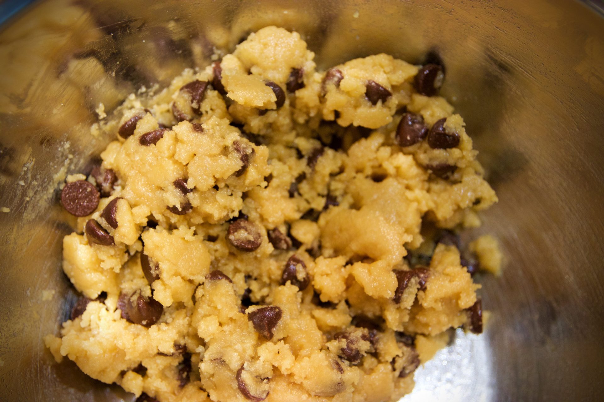 Up-close picture of chocolate chip cookie dough.