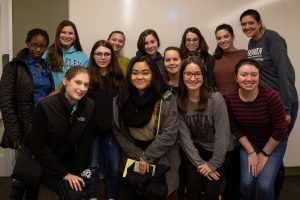 Women Engineers of Rowan University grouped together at group meeting. 