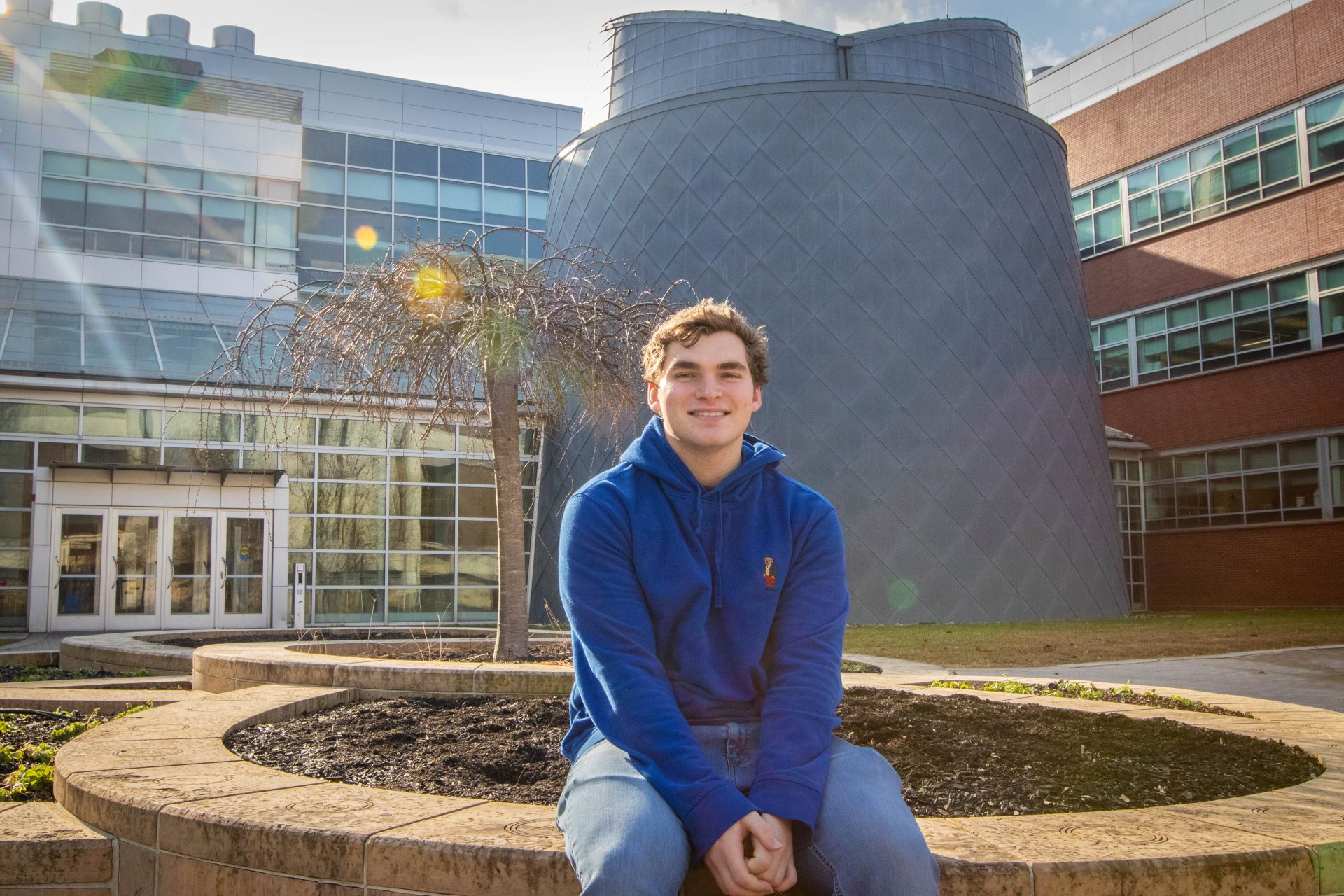 Max sitting on the Science Hall's front garden.