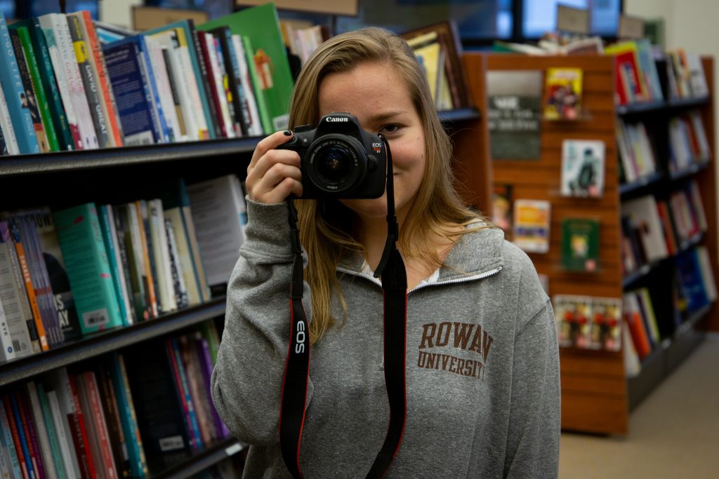 Kailey holding camera inside barnes and nobles inside book store 