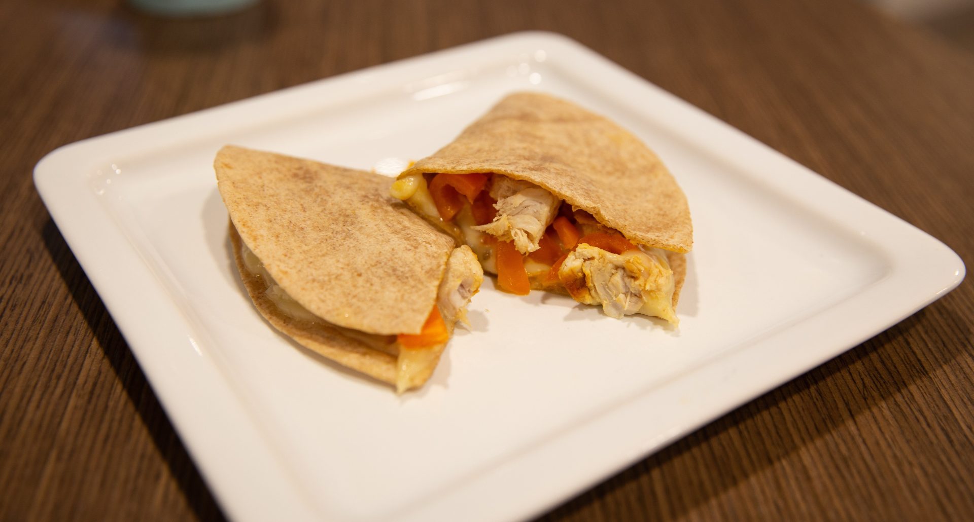 Cooked and plated chicken quesadilla.