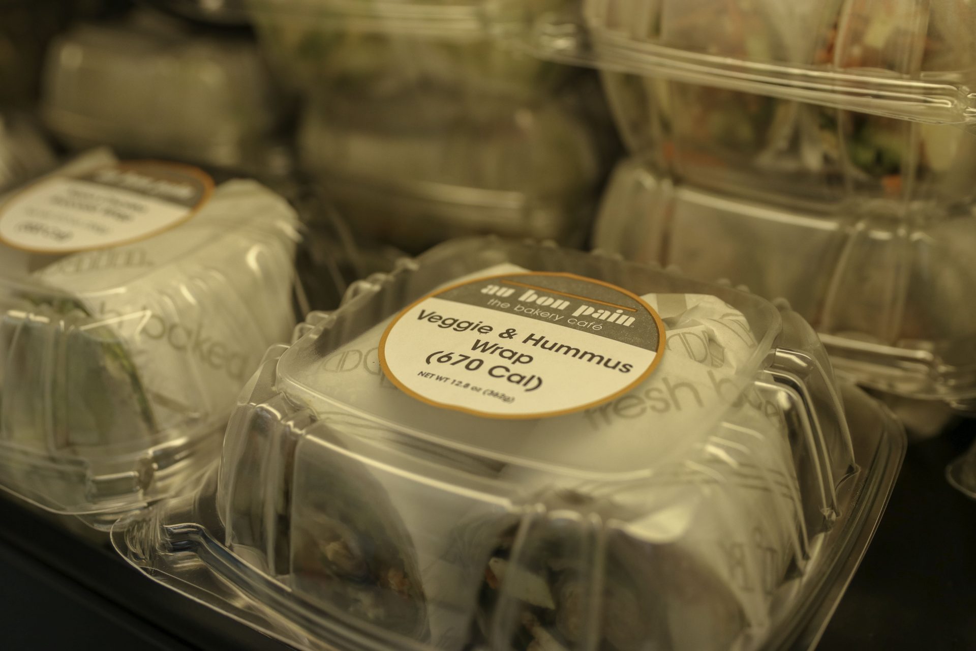 Close up of a clear plastic container with a wrap inside