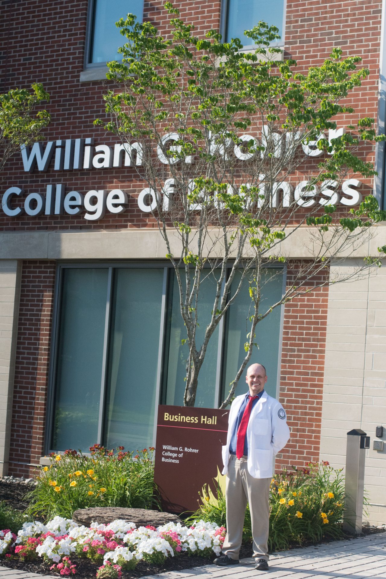 Rowan MBA alumnus and medical student Nathan Carroll outside Business Hall