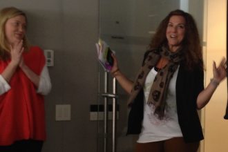 Rowan alumna Denise Vitola with her team at her agency