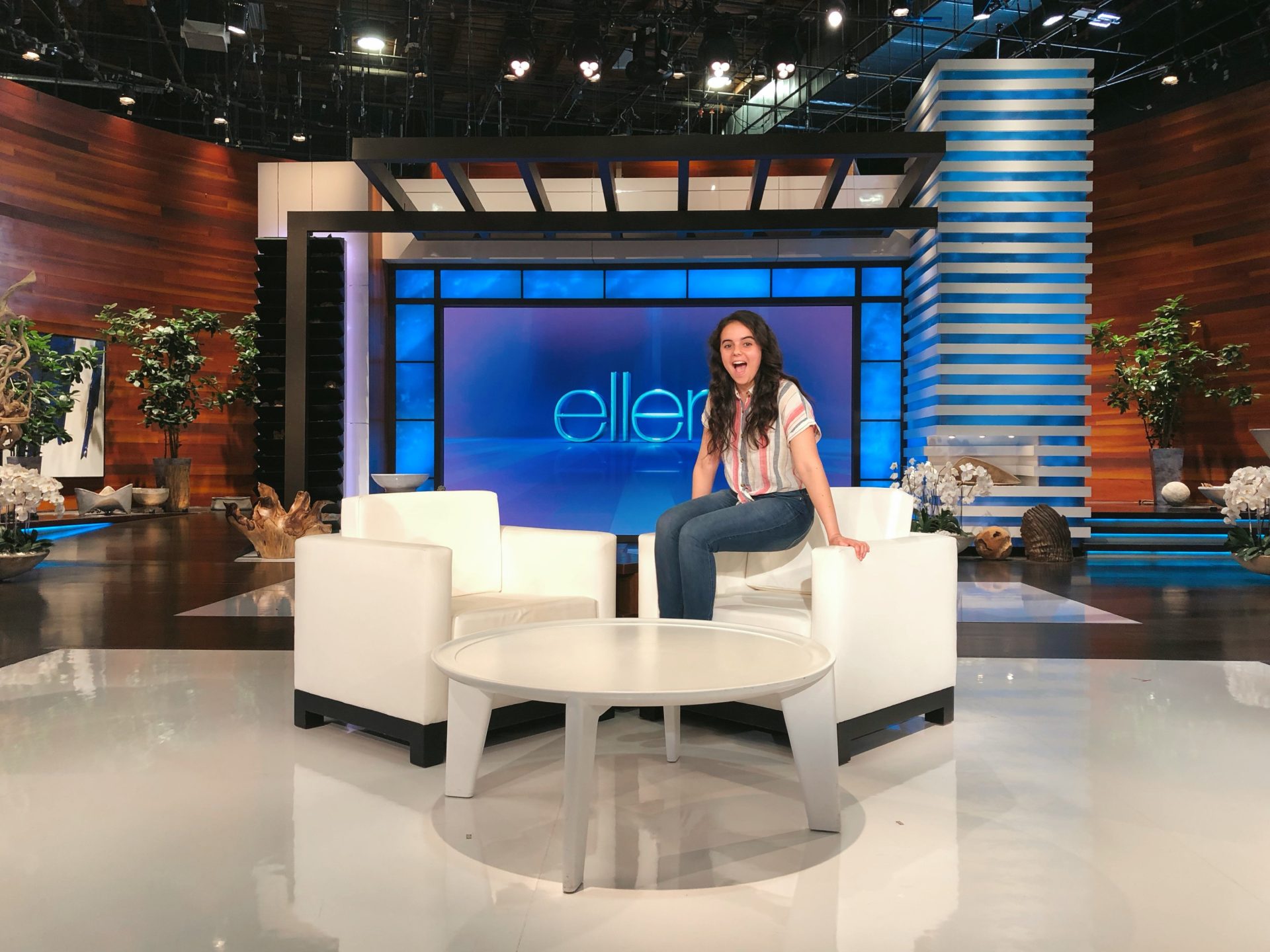 Rowan Journalism and RTF major Victoria Todorova sitting on "The Ellen Show" chair at the studio.