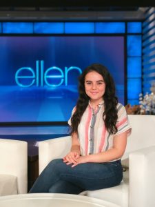Victoria Todorova sitting in Ellen DeGeneres's chair on the set of "The Ellen Show"