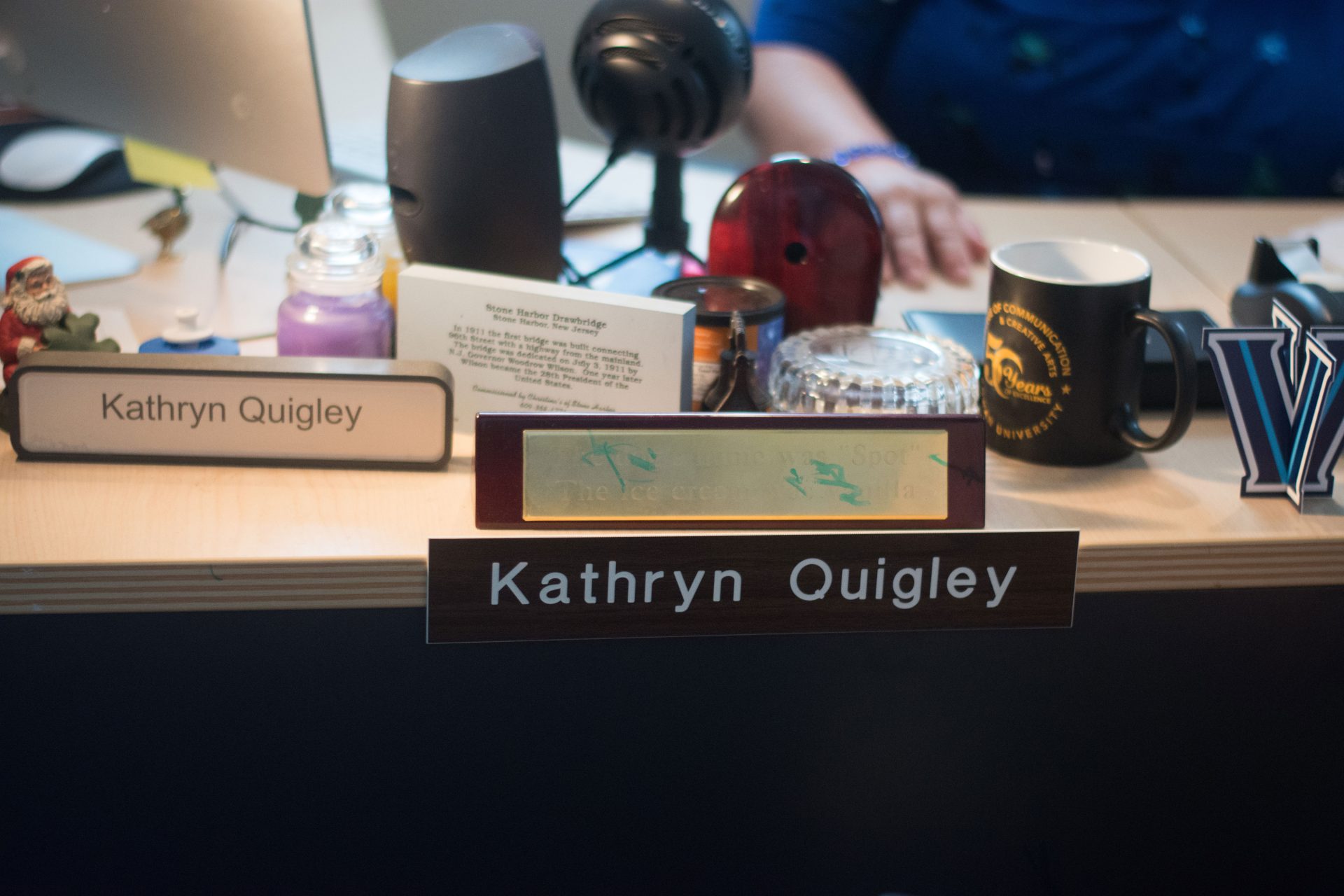 The name plaques of Professor Kathryn Quigley on her desk in her office