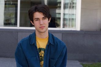 Rowan transfer student and Music Industry major Nikola Berardo photographed outside Engineering Hall