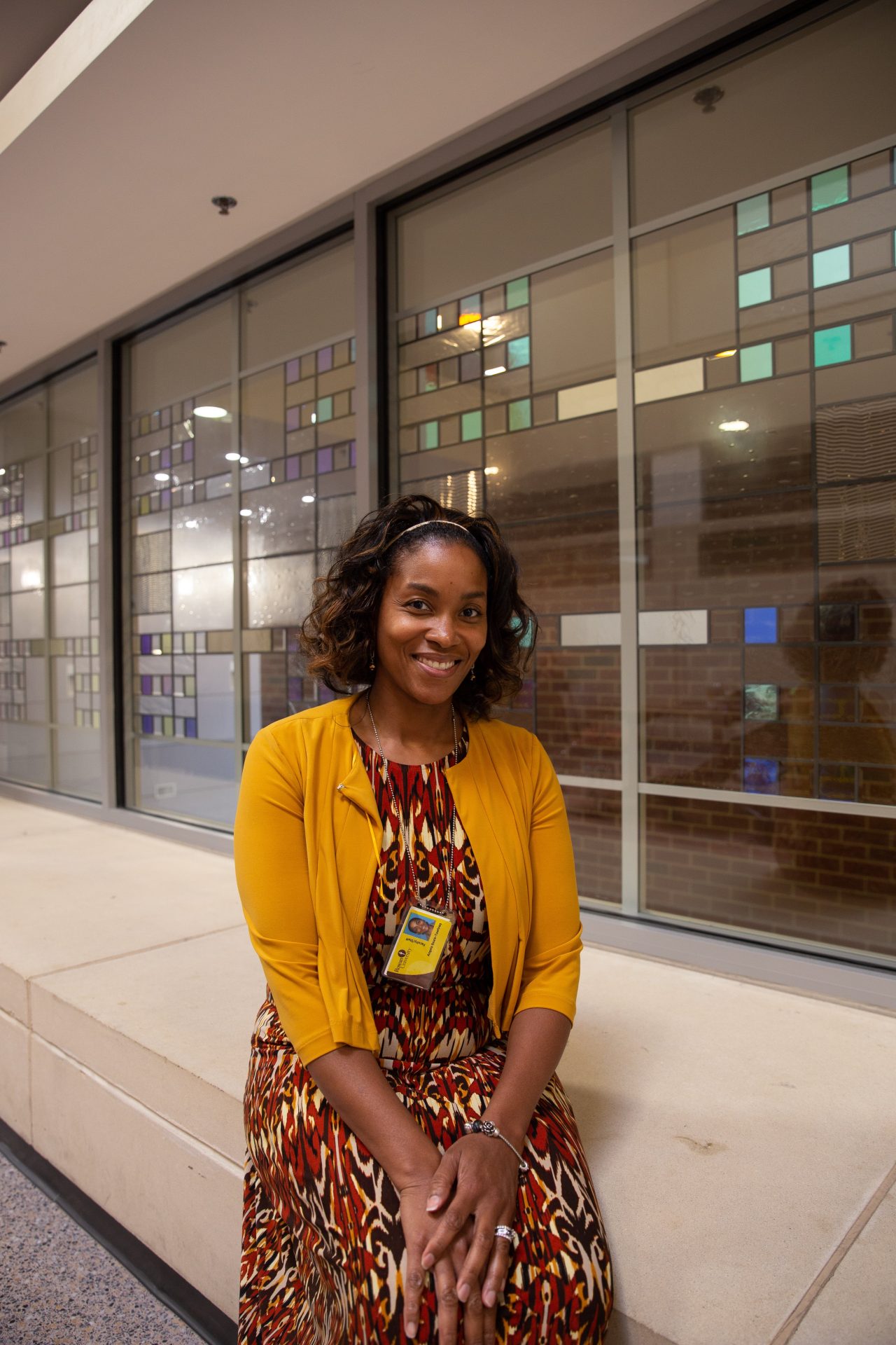 Dr. Angela Beale-Tawfeeq sitting in James Hall.