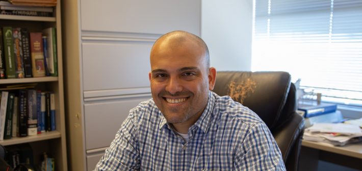 Rowan chemistry professor Dr. Moura-Letts in his office
