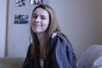 Transfer student Taylor in her dorm room at Holly Pointe