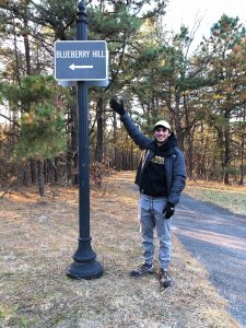 Jack points to the sign in Blueberry Hill park.