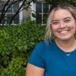 Communication Studies major Autumn Bowman sitting on campus