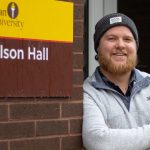 Music Industry major Jeff McConnell stands outside Wilson Hall