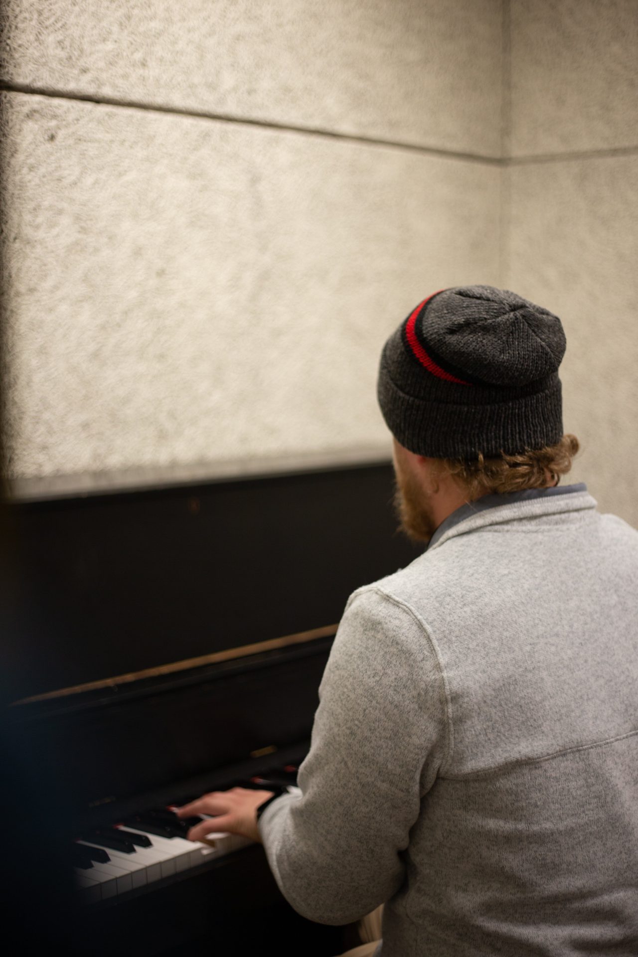 Jeff playing the piano in Wilson Hall.