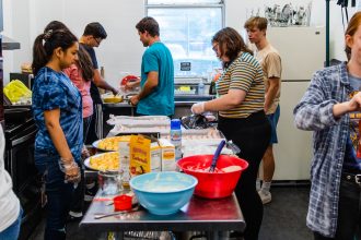 students cook at the ronald mcdonald house