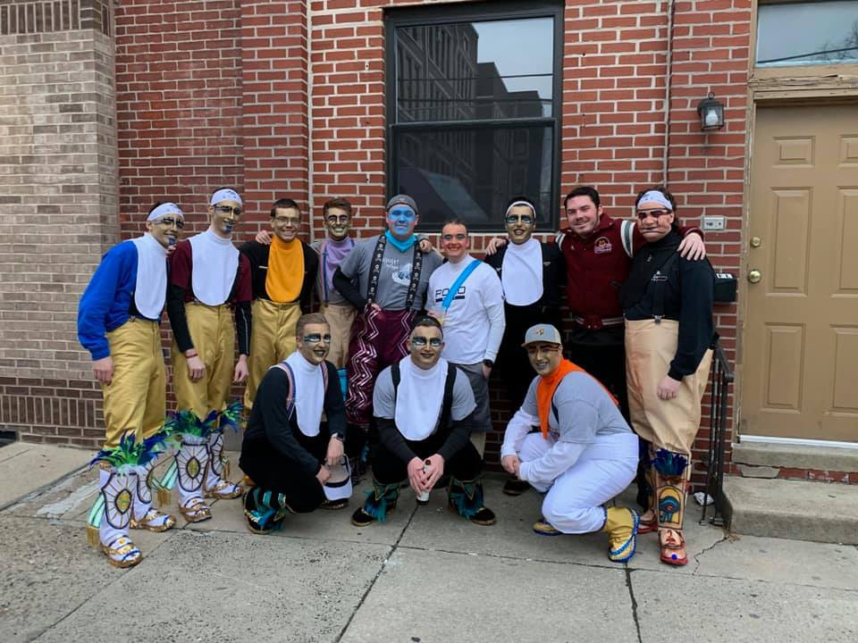 Rowan student TJ Ferry (third from left) with members of his Mummers team.