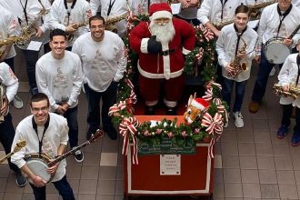 Rowan student TJ Ferry and members of his Mummers band