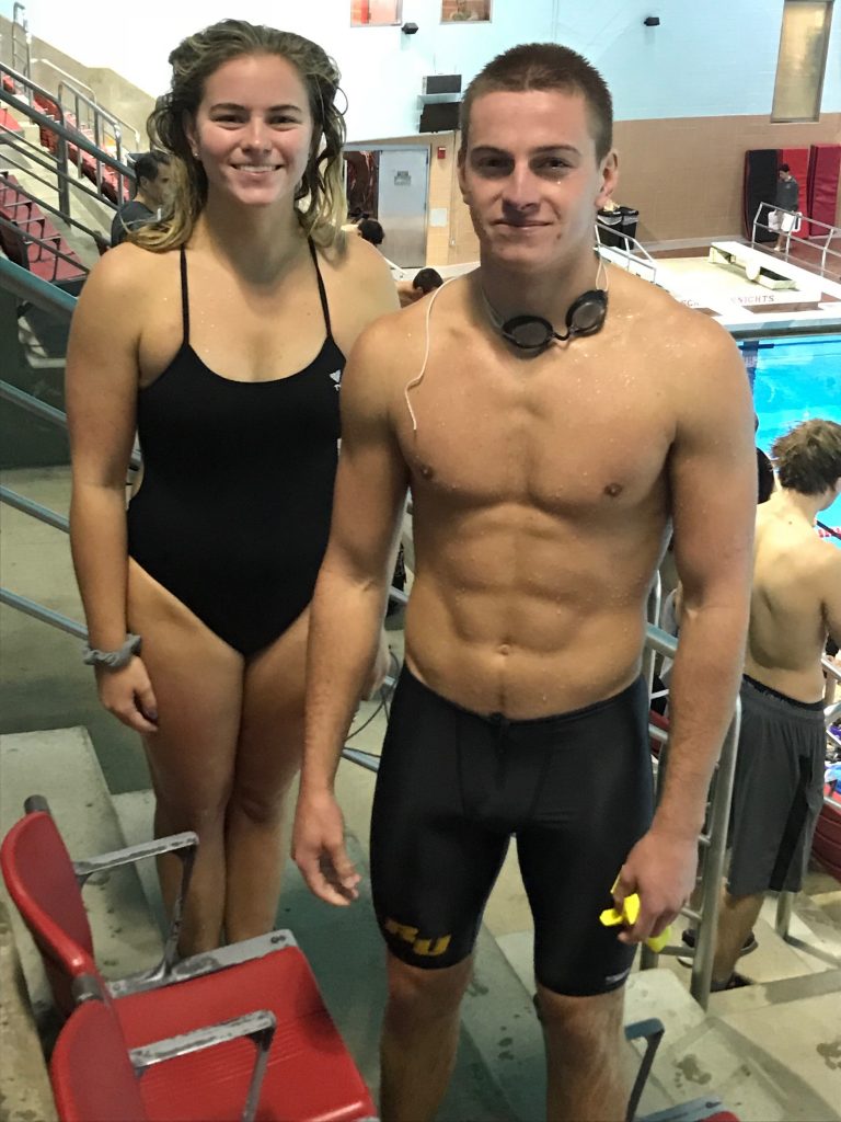 My brother and I at a swim meet for the Rowan club team.