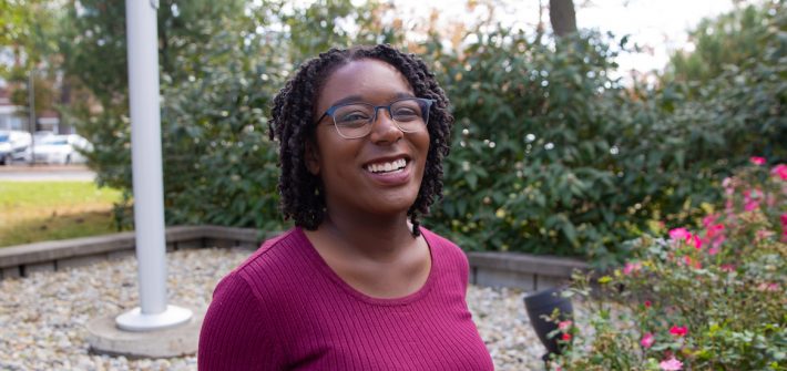 Jess Hassell poses outside of Bunce.