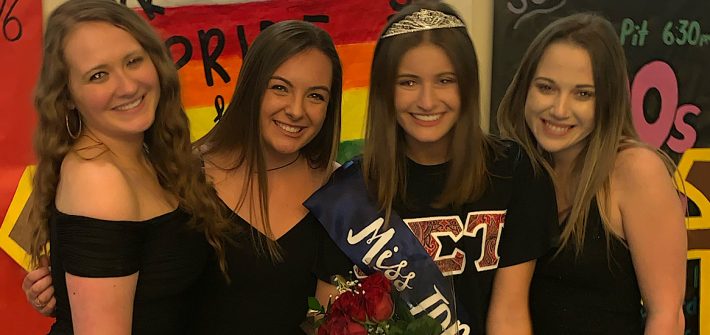 One of my favorite memories of my friends and I on stage after I won the Miss Tau Delta Phi Pageant.