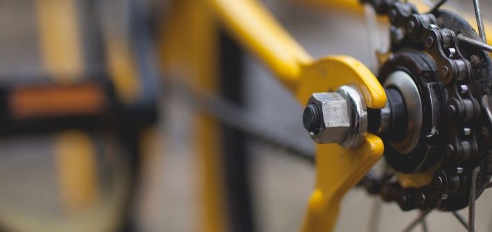 Close-up shot of yellow bicycle