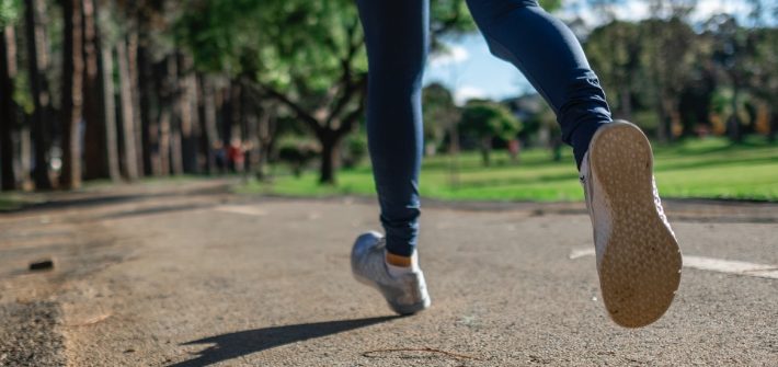 A stock image of a close up of running feet.