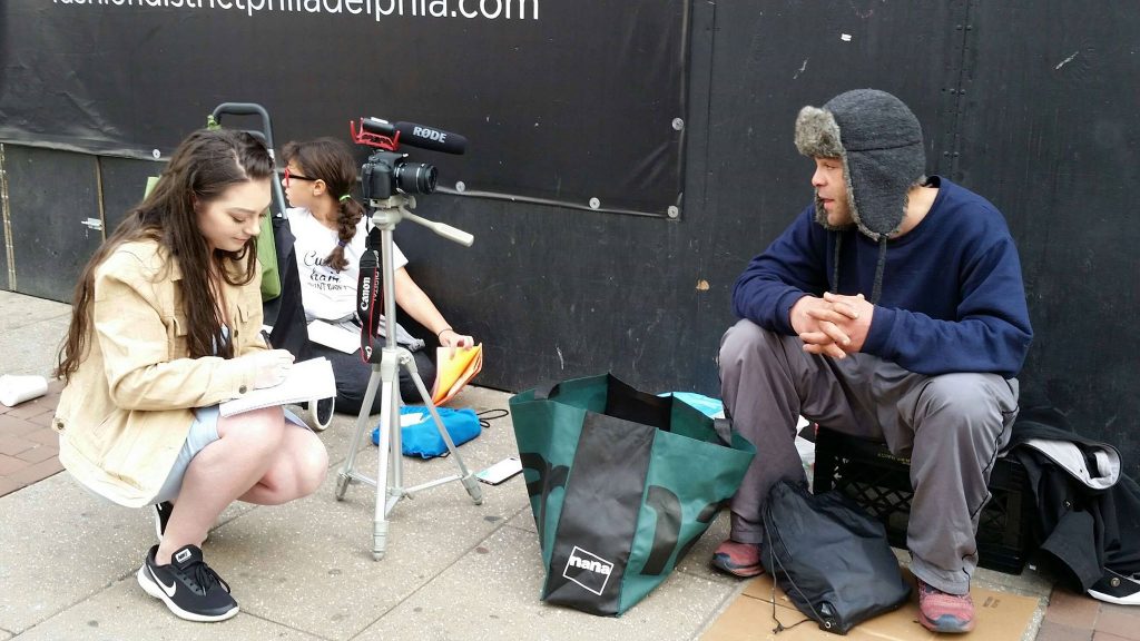 Rowan student Lauren Purnell interviews a subject for her blog on the homeless