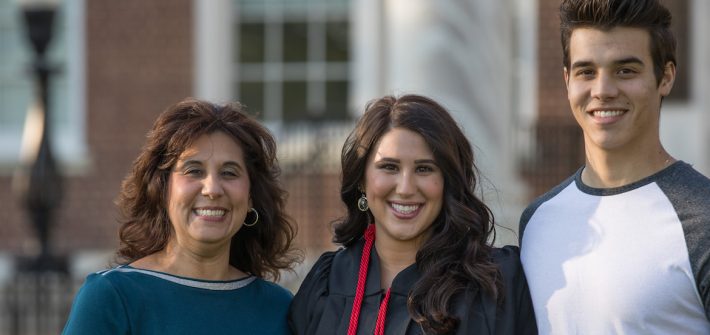 Emilyann poses with her family.