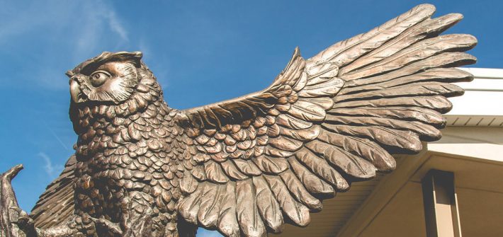 Exterior shot of owl statue on Rowan's campus
