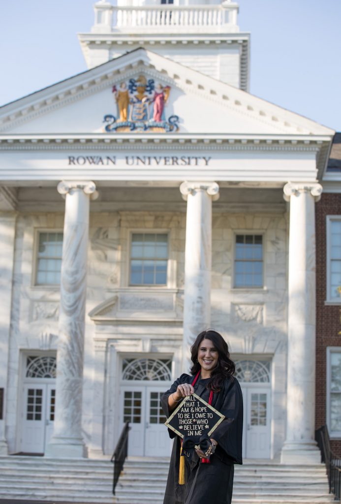 Emilyann Colbert poses in front of Bunce Hall.