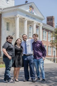 Computer science major Monica and her 3 friends in front of Bunce Hall.