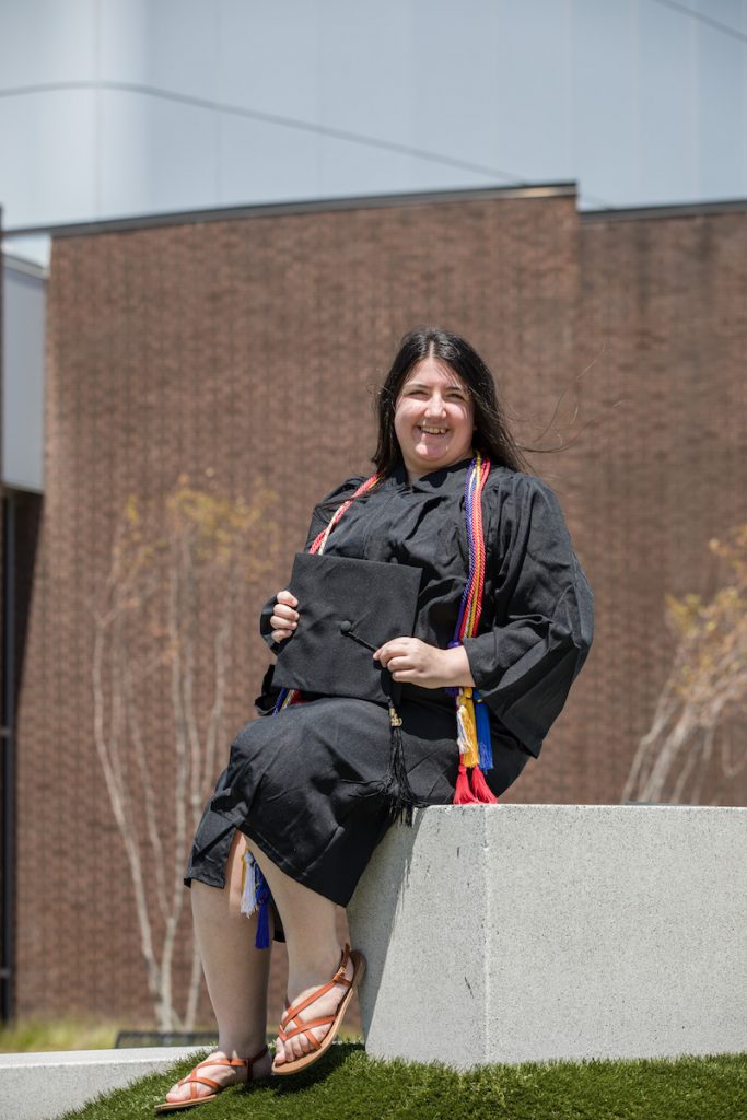 Accounting and finance double major Stephanie poses outside Wilson Hall.