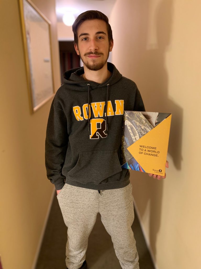 Music Education major and incoming freshman Anthony Demateis poses with his acceptance letter. 