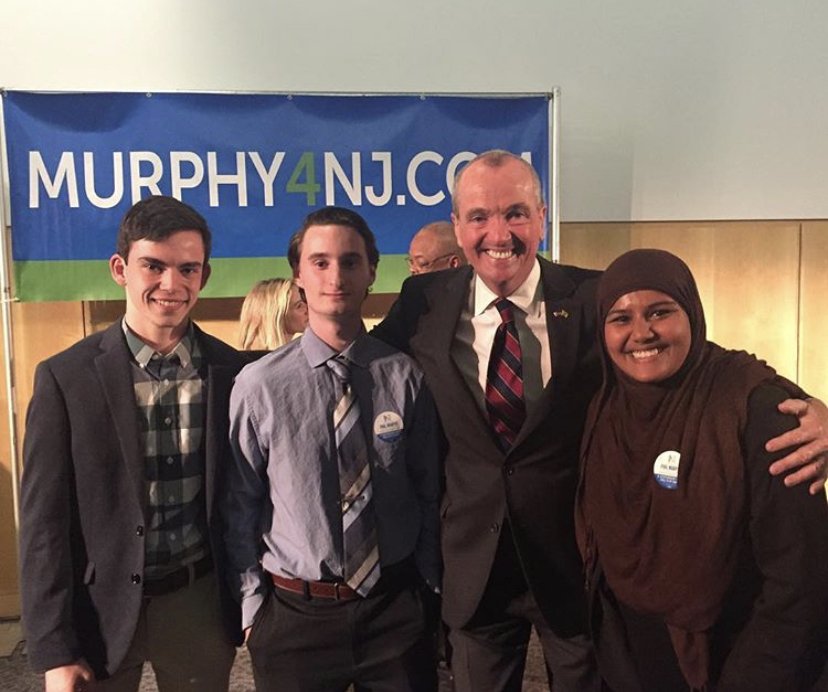 Kazi Hafiza with then-candidate Phil Murphy and other students